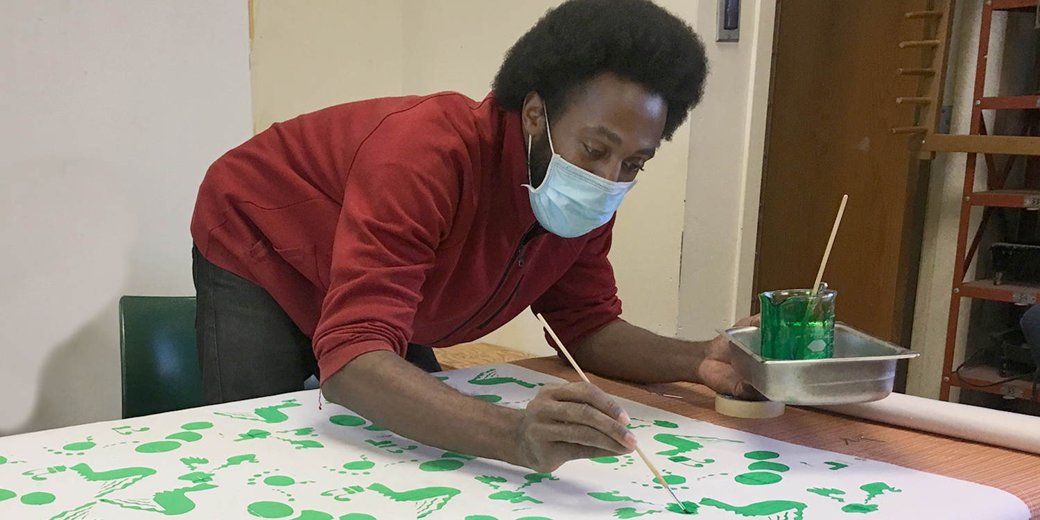 Textile Painting Student painting on fabric