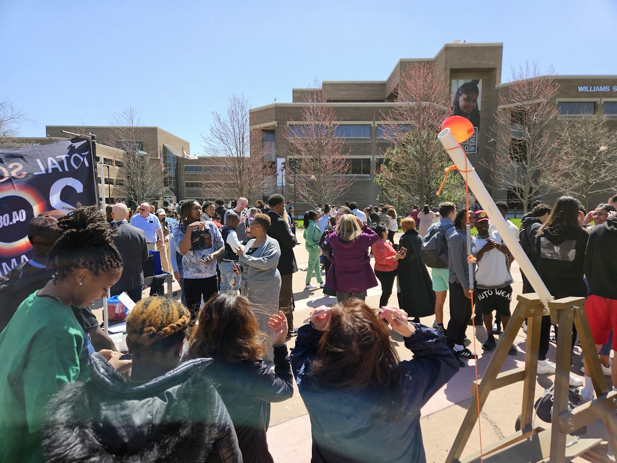 many people in CSU quad observing eclipse