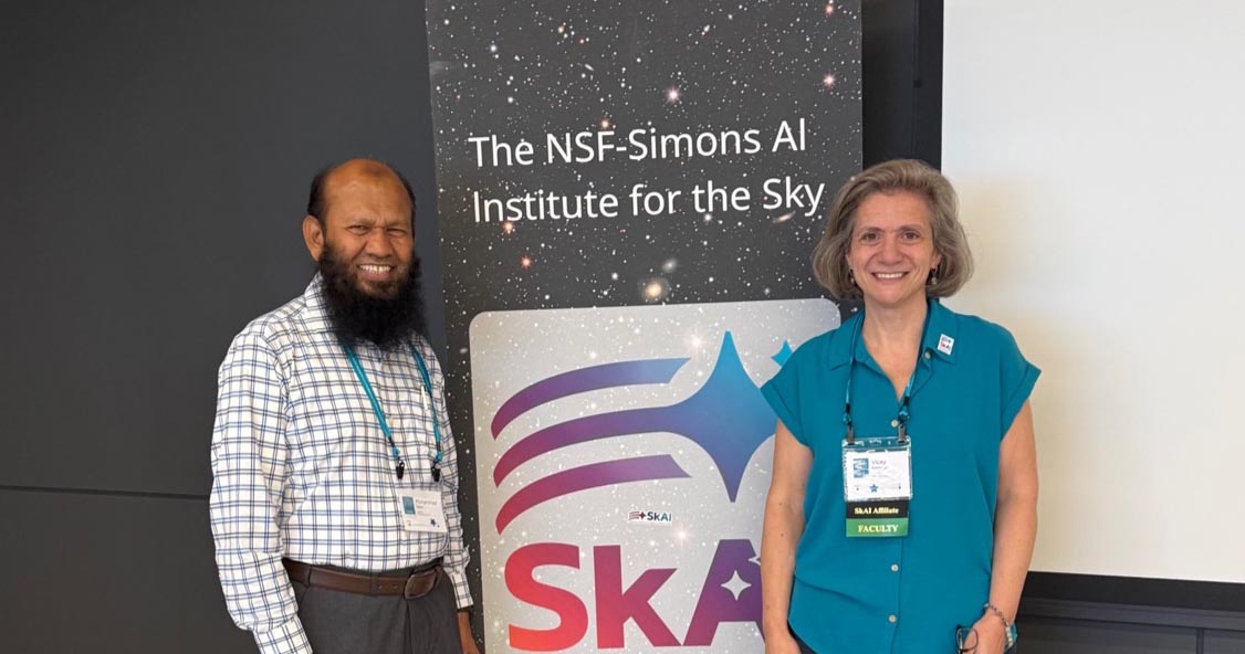 Dr. Mohammad Salam and Dr. Vicky Kalogera smile while standing alongside a retractable banner that reads "The NSF-Simons AI Institute for the Sky."