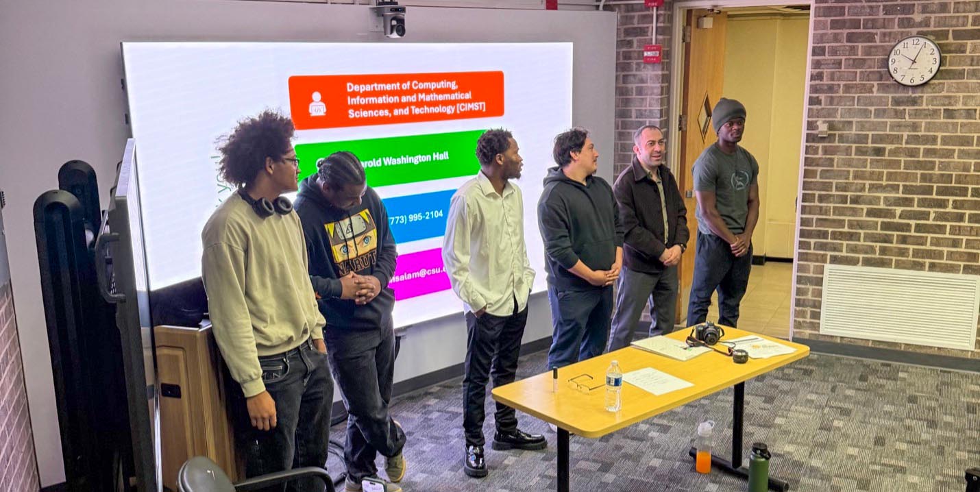 Six Chicago State University students stand in front of the classroom to share their experiences in the CIMST program.