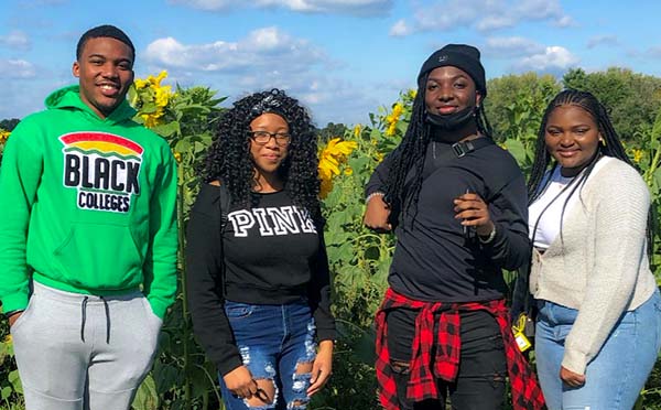 4 Students Sunflower Field