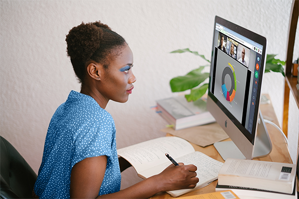 Female Student Watching Webinar