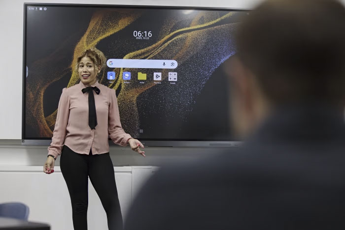 Angelica Tapia teaching a business class at Chicago State University.